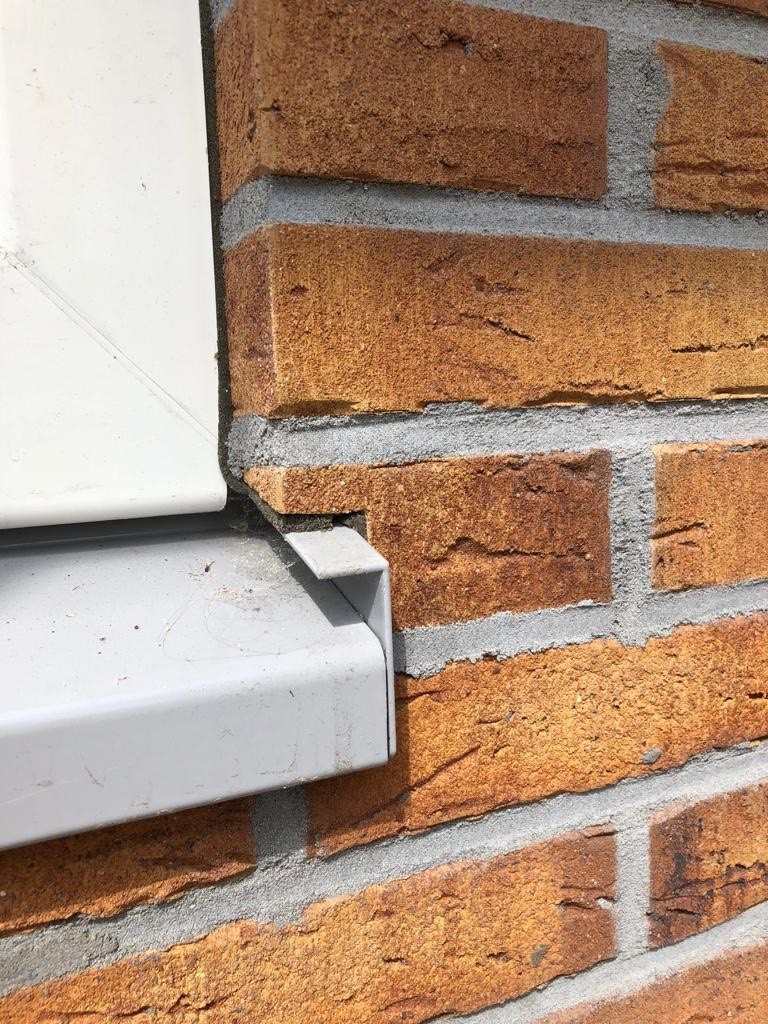 waterslag met kopschot stucwerk en steenstrips